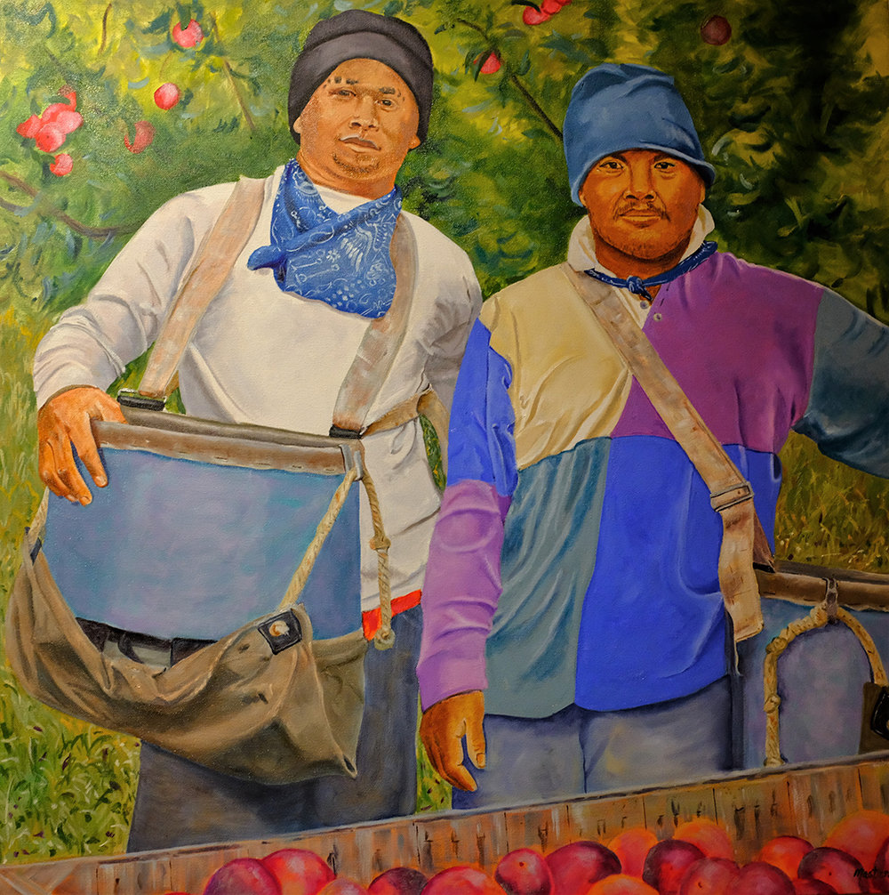 A pair of apple pickers fill up a wooden bin. This work is titled “Noble Workers”.